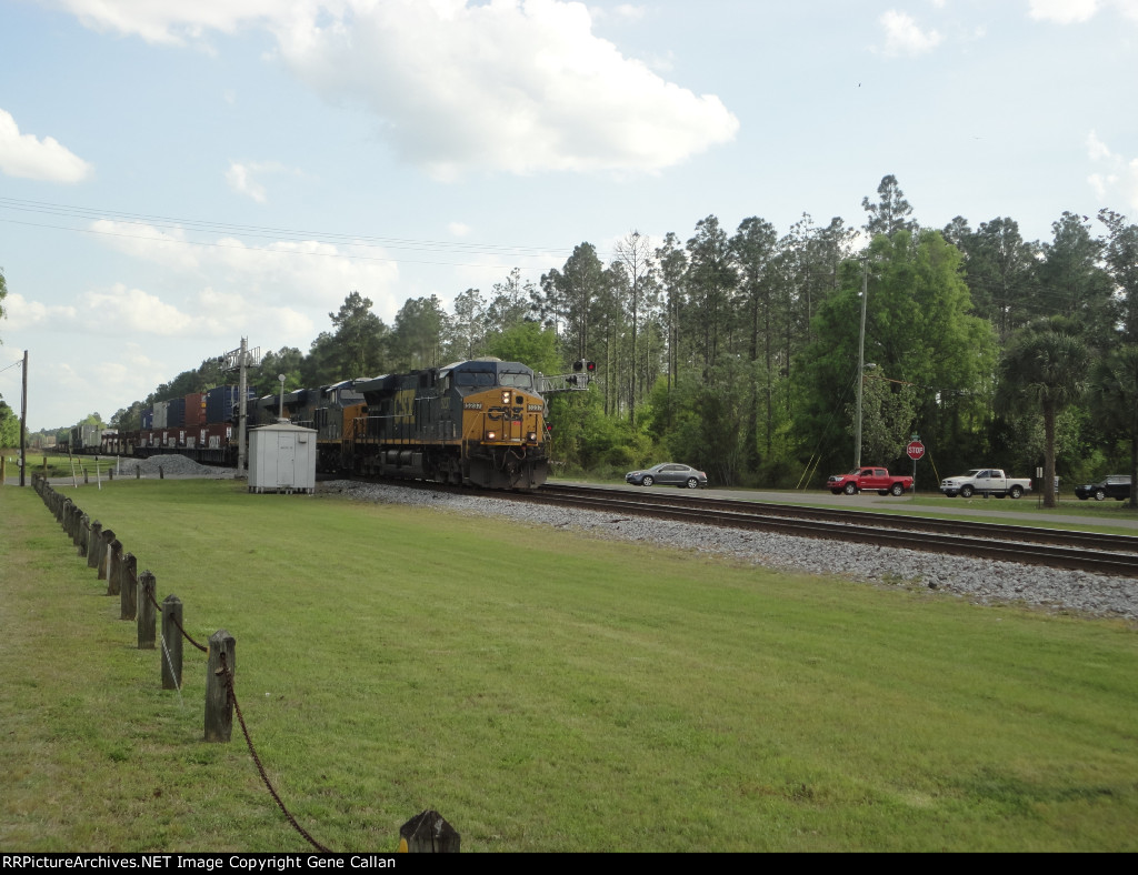 CSX 5237 leads an intermodal past Martin St.